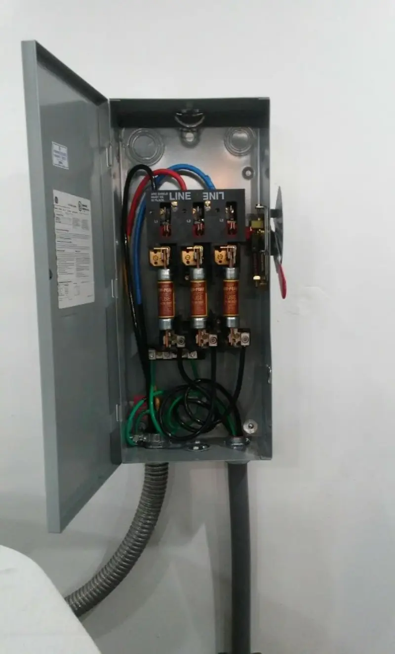 Three-phase disconnect switch installed for Smoke Detector Installation in Greenwich